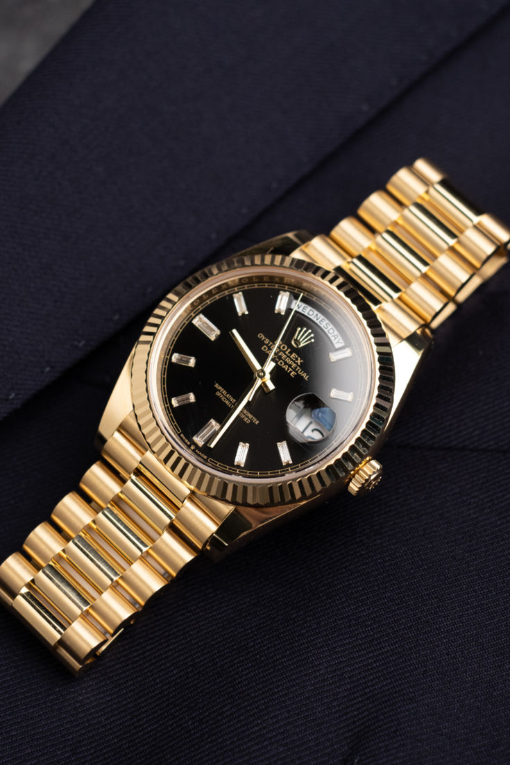 Rolex Oyster Perpetual Day-Date Black Dial.
