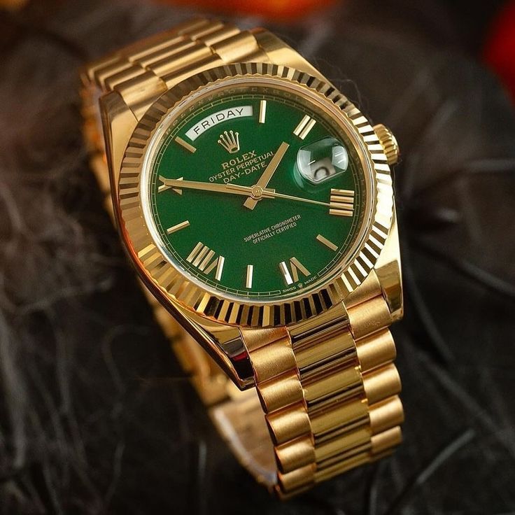 Rolex Oyster Perpetual Day-Date Green Dial.