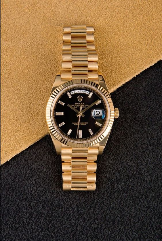 Rolex Oyster Perpetual Day-Date Black Dial.