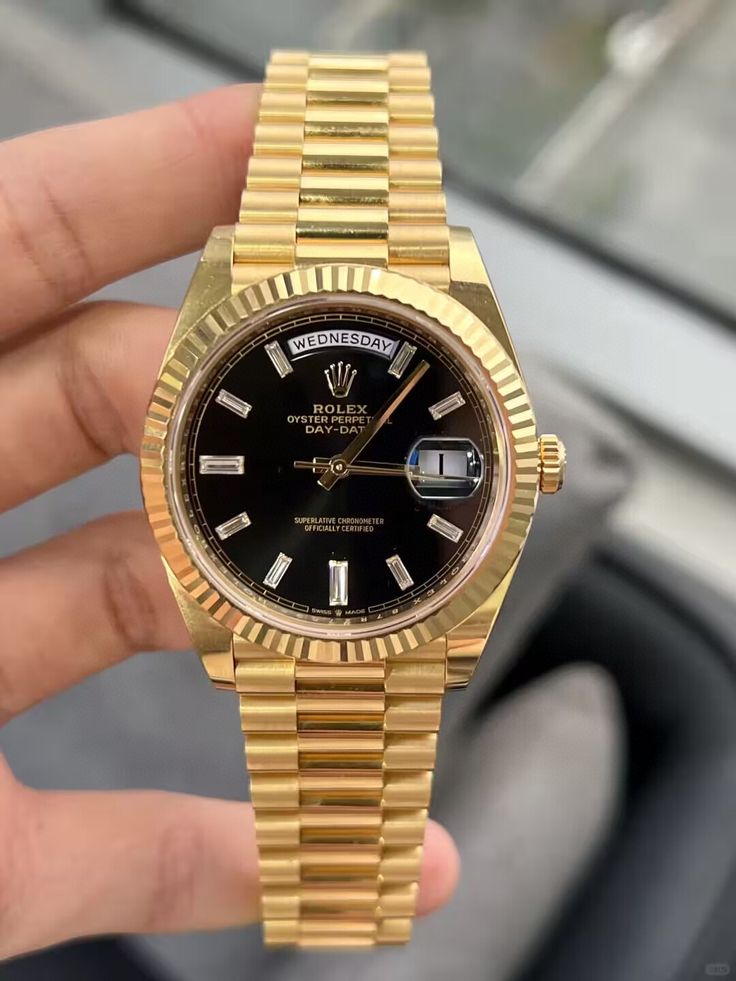 Rolex Oyster Perpetual Day-Date Black Dial.