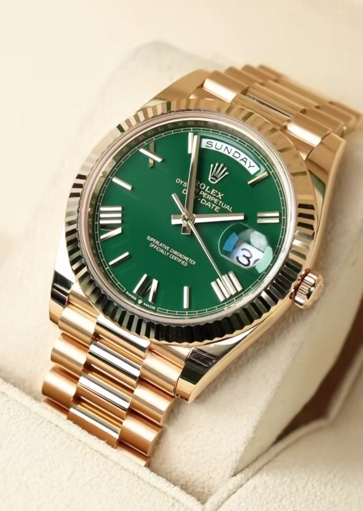 Rolex Oyster Perpetual Day-Date Green Dial.